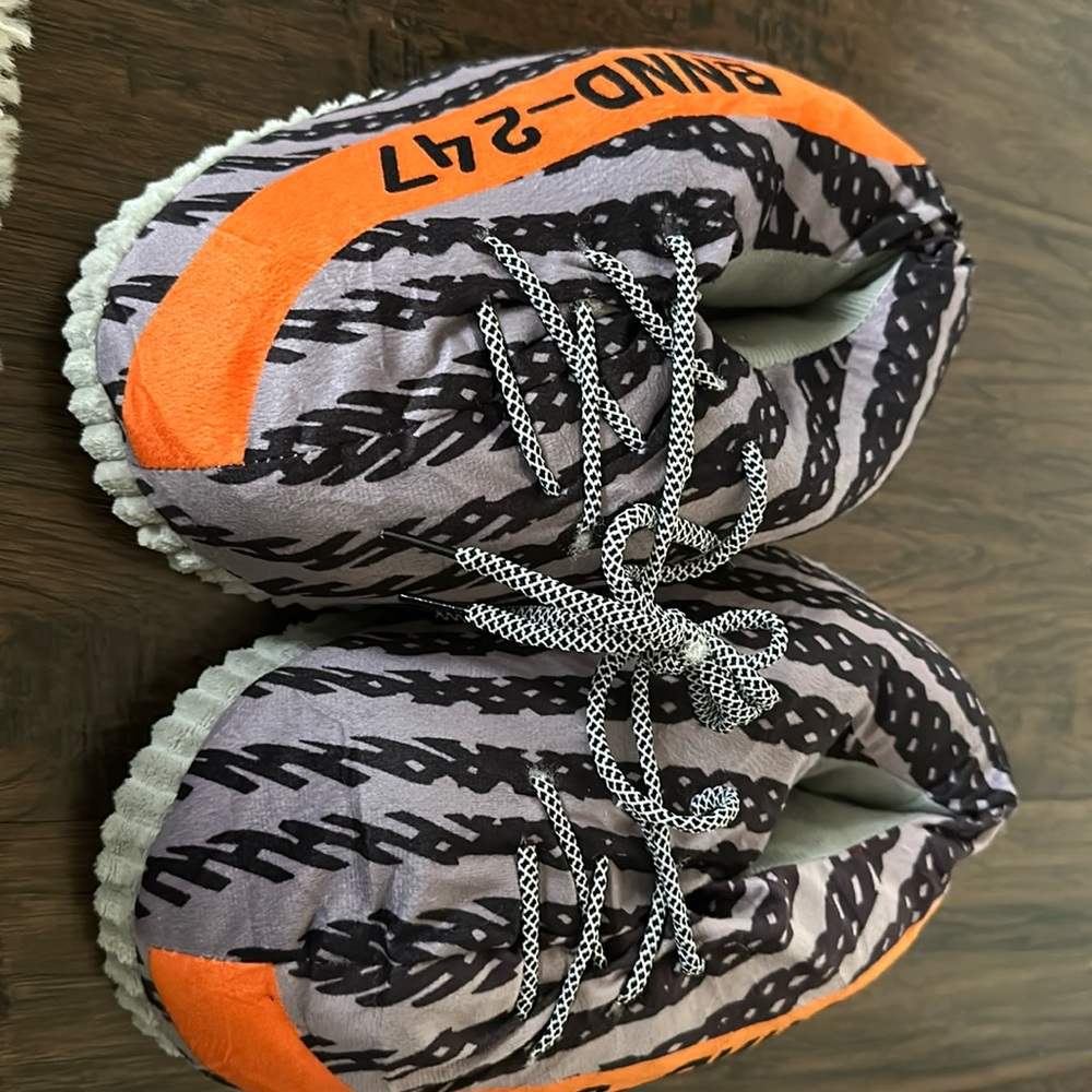 Yeezy designed plush indoor slippers.